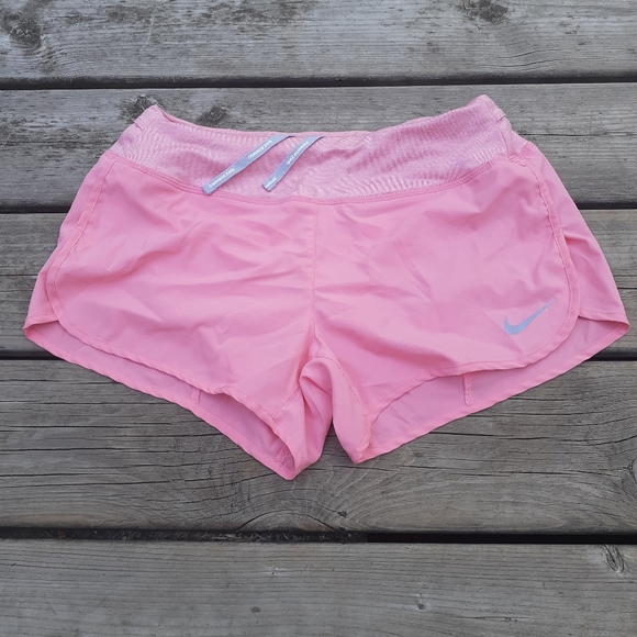 Nike Pants - Nike running shorts light pink size Small